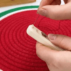 Elegant 2-in-1 sewing tool featuring a needle threader and seam ripper, crafted from durable plastic, in a sleek black and silver design 0