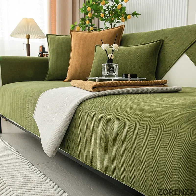 Elegant non-slip sofa cover in a soft gray fabric, designed for a cozy living room refresh. Features a textured pattern for added style and durability, ensuring 4